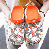 sandals 2021 Summer Sandals Hollow Out Breathable Beach Slippers Flip Flops EVA Men and Women Couple's Porous
