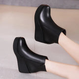 Autumn / Winter Short Boots Women's Round Head Slope Heel Middle Heel Large Size Women's Boots Thick Bottom Slope Heel Waterproof Table Martin Boot