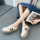 Slippers Women Wear A Pair Of White Shoes With Thick Soles Without Heels In